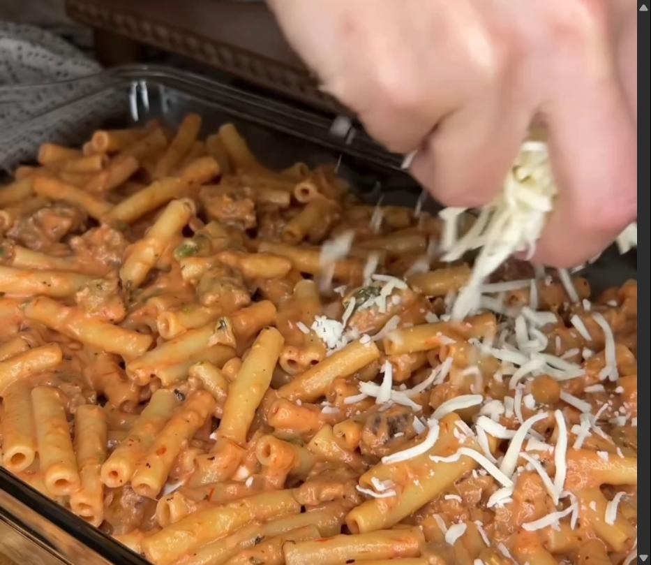 Step 1.1: Sprinkle shredded mozzarella and grated Parmesan over the top