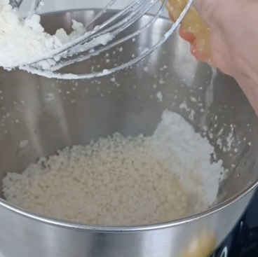 Step 2.1: Mix together the butter and powdered sugar in a blender