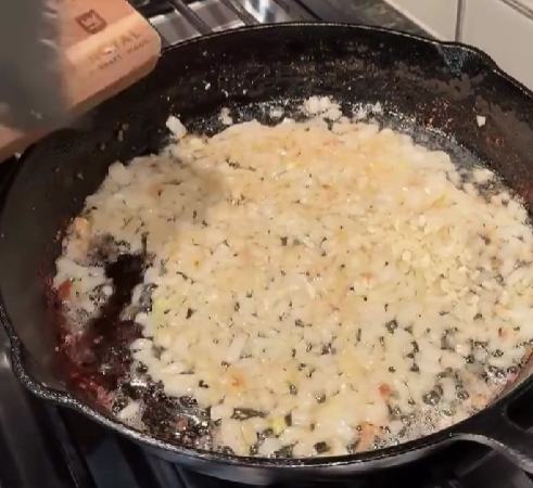 Step 2.1: Add diced onion to the skillet and cook until soft