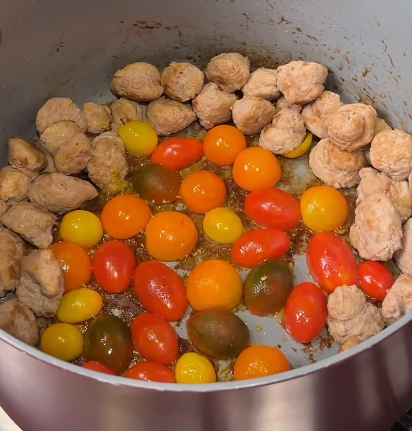 Step 1.1: Add cherry tomatoes cut-side down and let them blister for 2–3 minutes