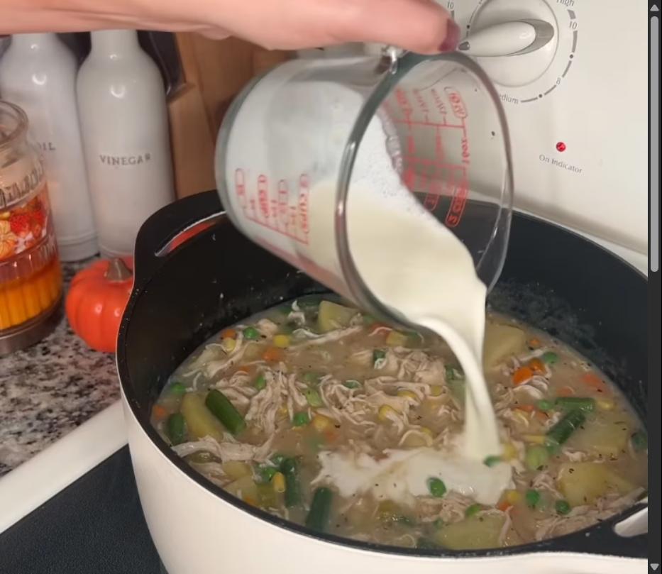 Step 1.1: Stir in heavy whipping cream and heat until the soup is warmed through