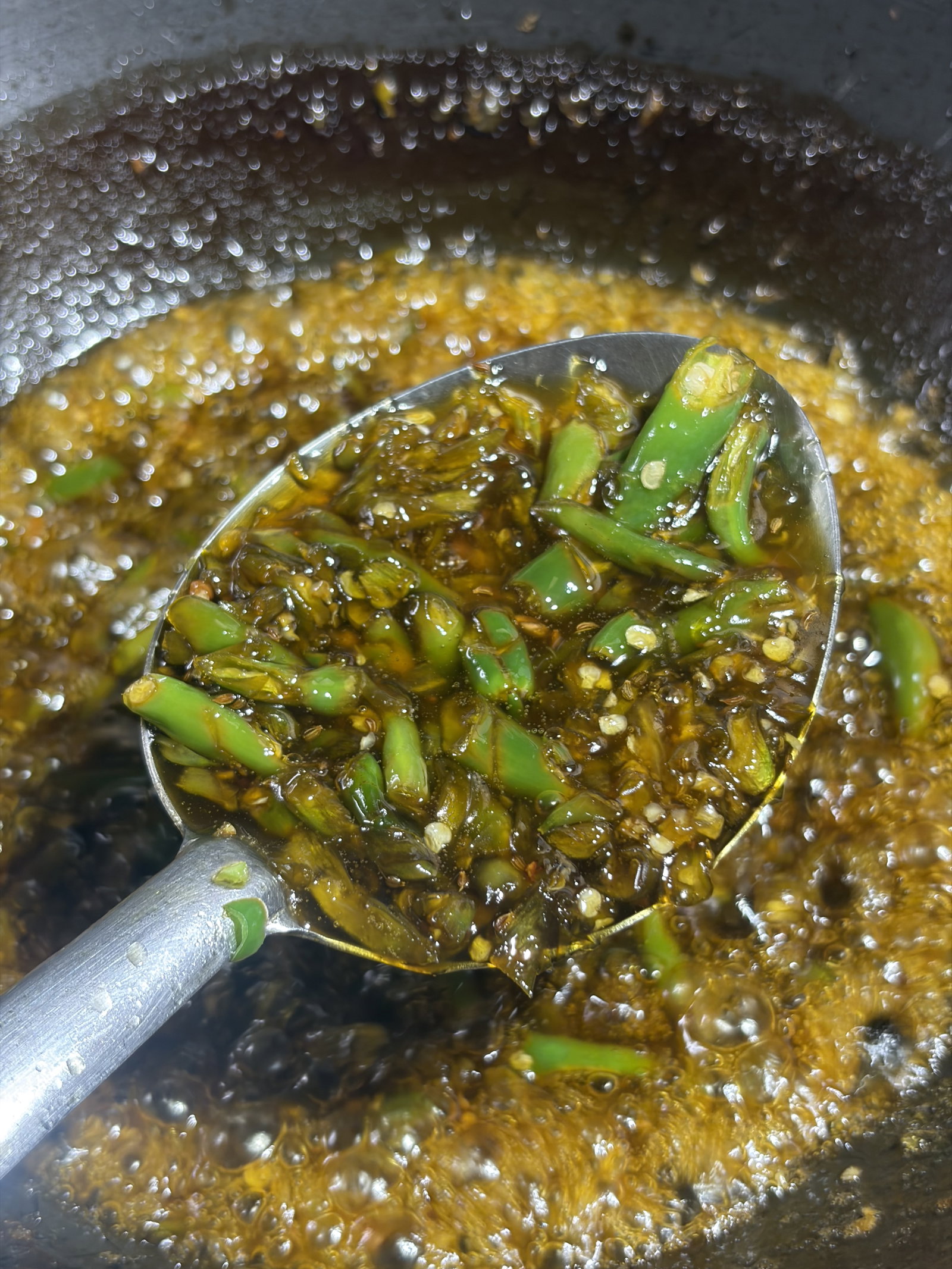 Step 3.1: Add the chopped green chillies and mix well