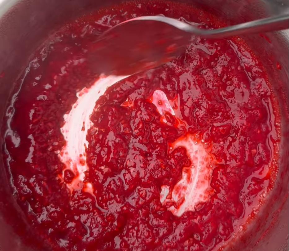 Step 1.1: Cook the raspberries until the excess liquid evaporates, then layer them on top