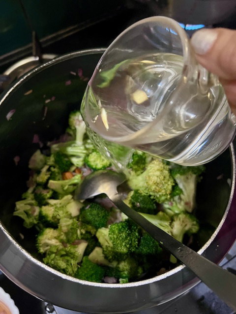 Step 1.1: Pour in 3 cups water, cover, and cook on medium heat for 10–12 minutes until broccoli is just tender
