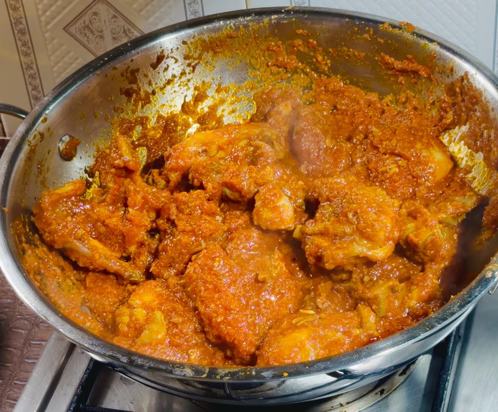 Step 3.2: Pour in the tomato puree and mix well