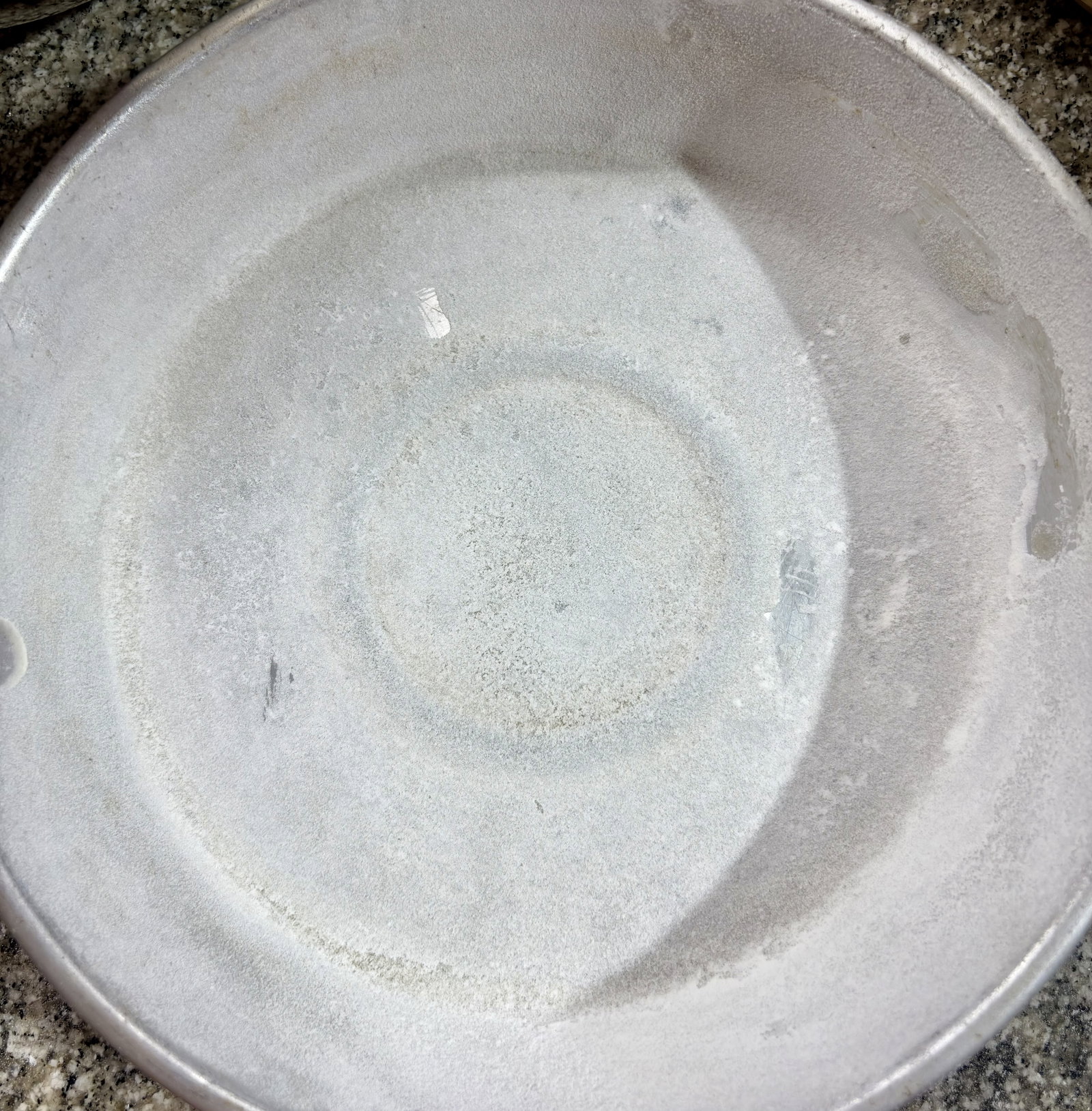 Step 1.1: Grease a 7-inch cake tin and dust it with flour or line with parchment paper