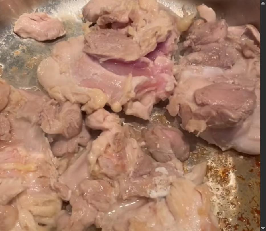 Step 1.1: Heat olive oil in a medium-sized pot and brown the chicken thighs until golden