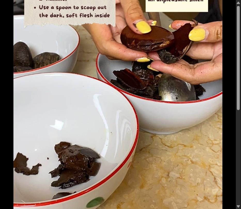 Step 1.1: Crack the kluwek shells with a mortar and pestle or hammer, and scoop out the dark, soft flesh inside