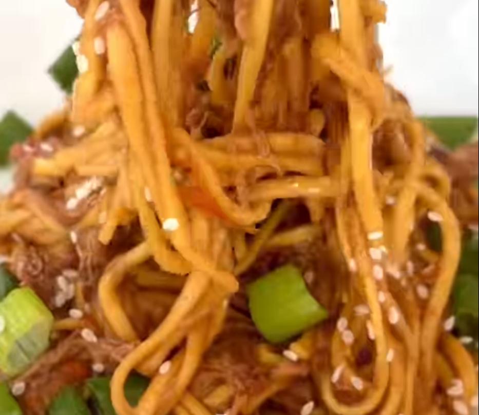 Step 1.1: Finish with a garnish of spring onions and sesame seeds for added freshness and crunch