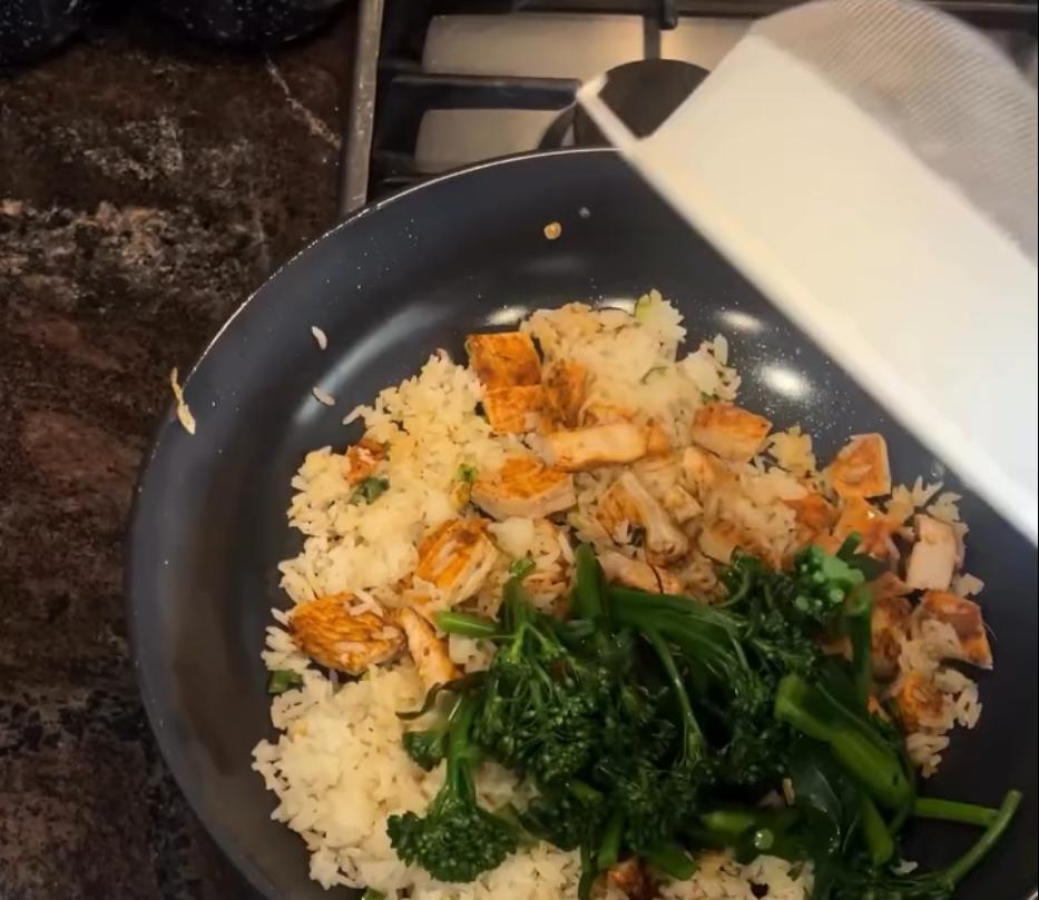 Step 1.1: Add the broccolini and the cooked chicken and stir fry over high heat until heated through
