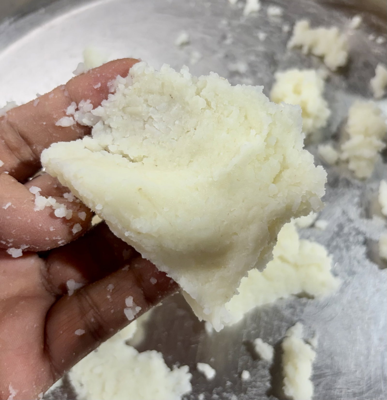 Step 2.1: Add the mashed rice to the pan and stir well to break up any lumps