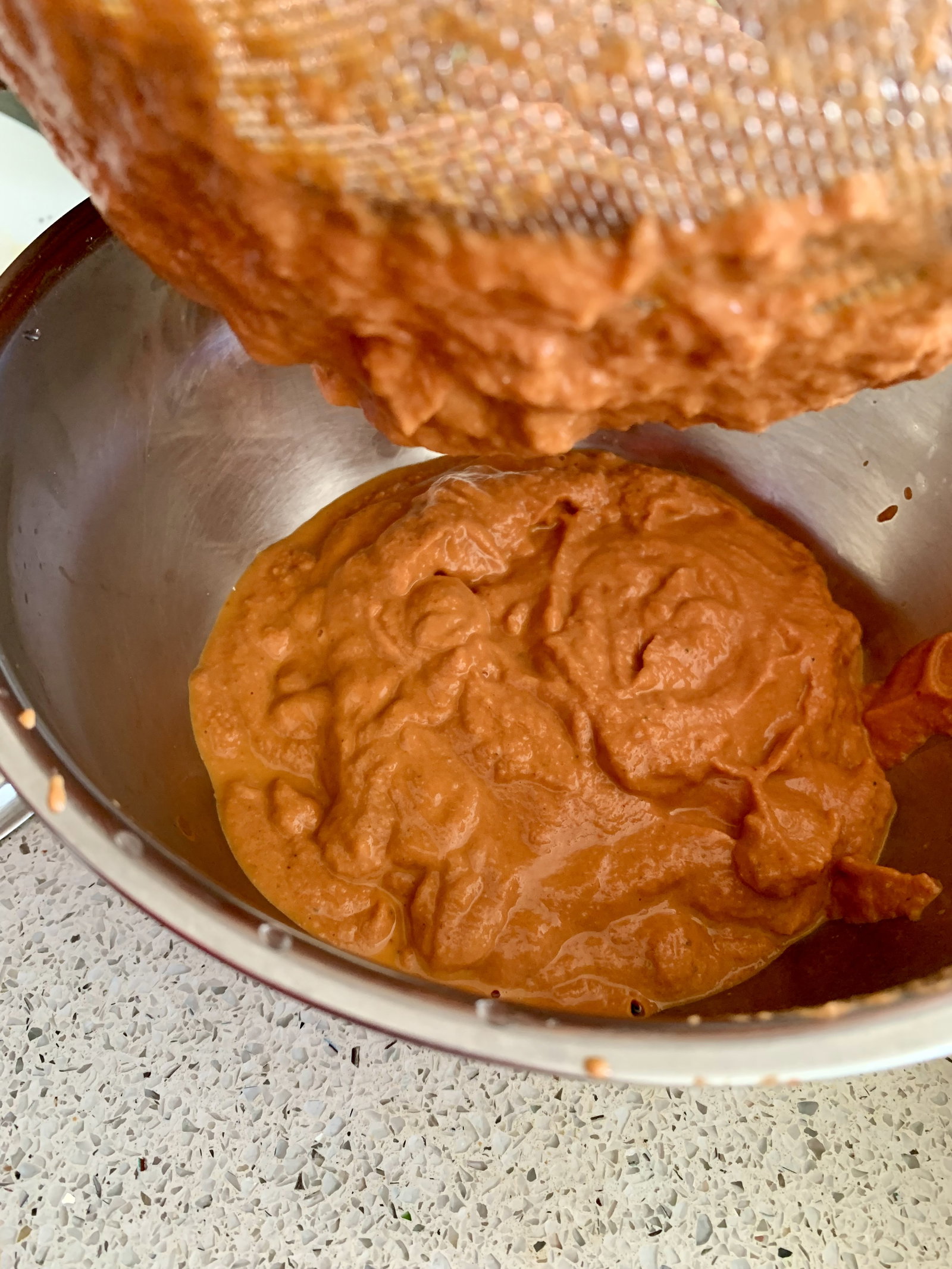 Step 3.1: Strain the puree for a rich, restaurant-style silky texture