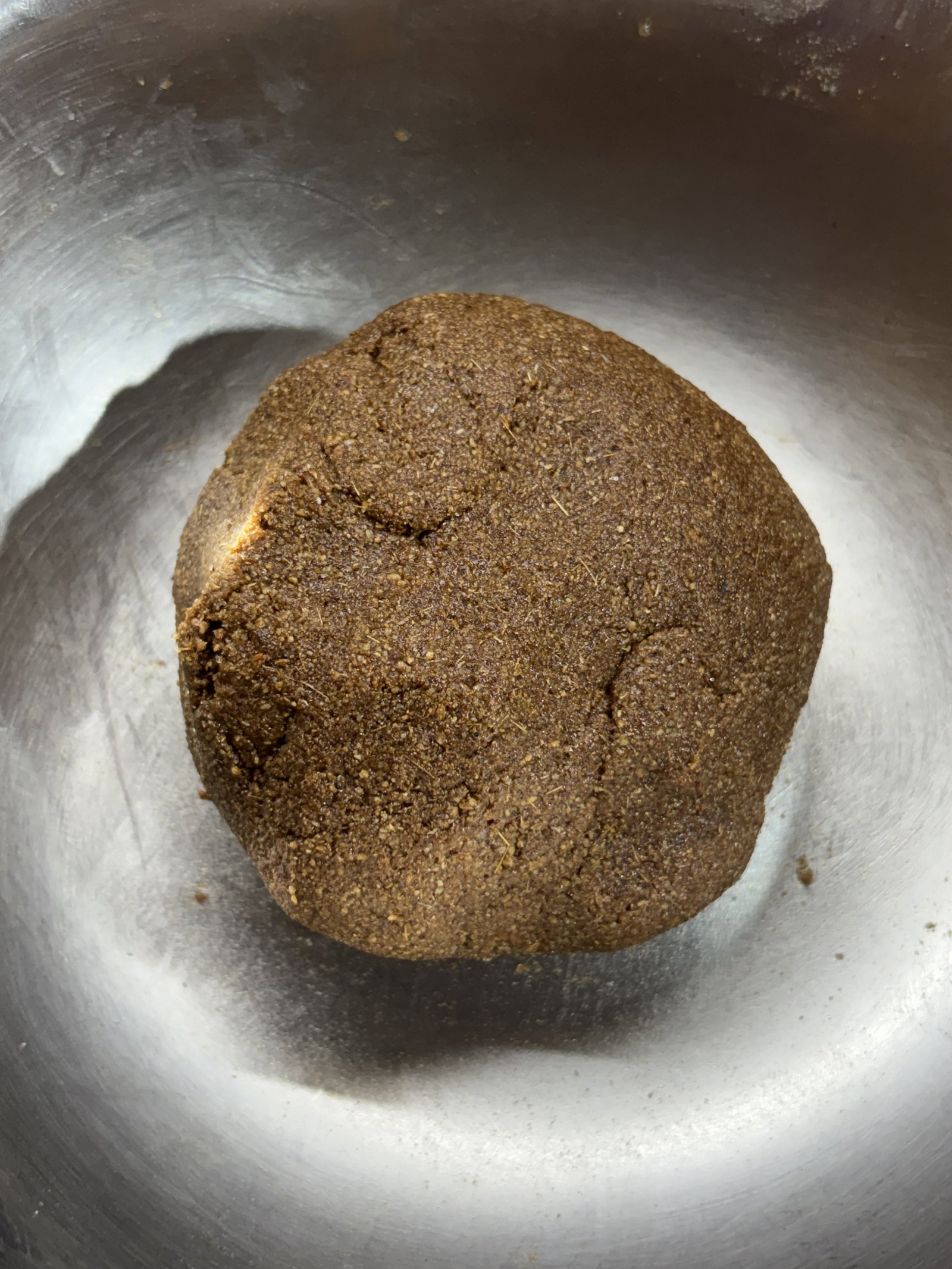 Step 3.1: Bring the mixture together and knead to form a tight, smooth dough