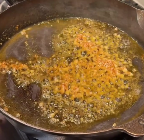 Step 2.1: Add butter and garlic, stirring for 30–45 seconds until fragrant