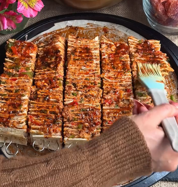 Step 2.1: Place the kebabs on the pan and paint them well with the glaze again