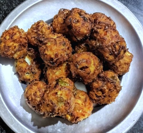 Step 2.1: When the oil becomes hot, add the balls and fry until golden brown on medium flame