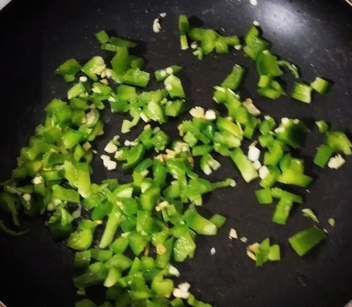 Step 1.1: Add chopped capsicum and enough salt