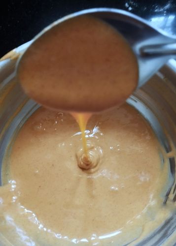 Step 1.1: Gradually pour water to make a medium-thick batter