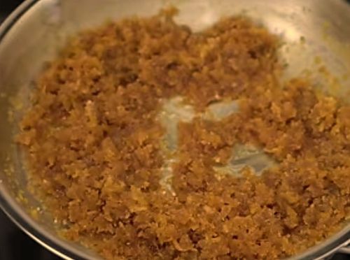 Step 1.1: Cook until 3/4 of the moisture from the grated coconut is reduced