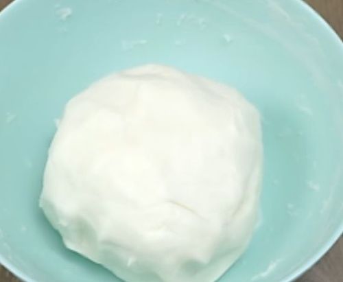 Step 2.1: Add 1/2 tbsp of ghee and knead the dough until it becomes soft and non-sticky