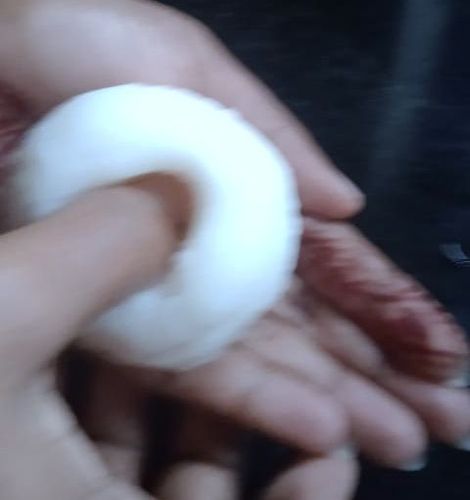 Step 2.1: Take one ball and press into the center with your thumb to make a bowl shape