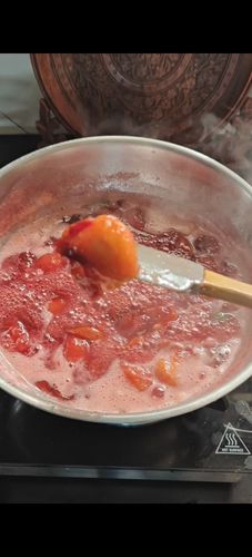 Step 1.2: Boil the mixture until the plums are soft and mushy