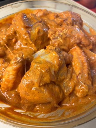 Step 1.1: Mix thoroughly, coating all chicken pieces evenly