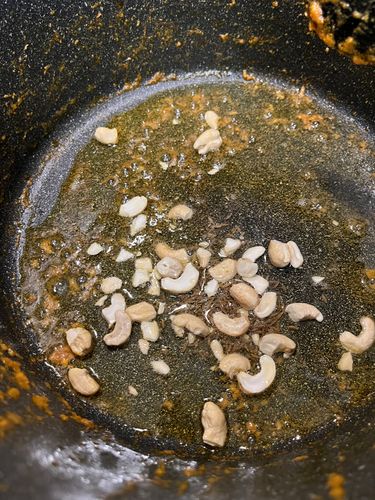 Step 4.2: In the same kadai, heat oil and temper with cumin seeds