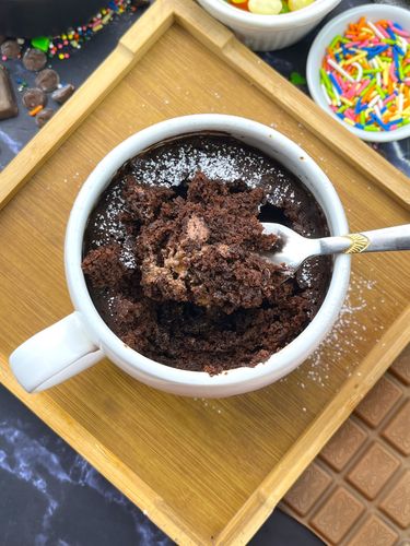 Step 1.3: Dust with powdered sugar while warm and enjoy straight from the mug