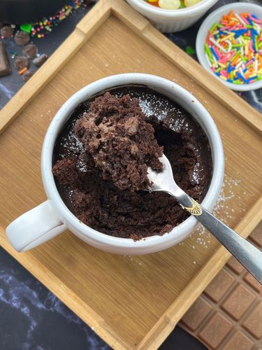 Step 1.4: Dust with powdered sugar while warm and enjoy straight from the mug