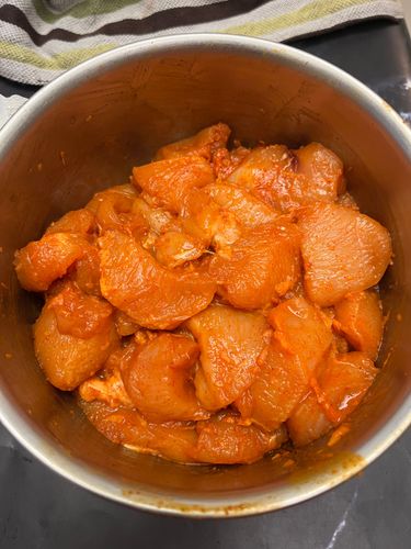 Step 1.1: Use your hand to rub the spices into the chicken so each piece is well coated