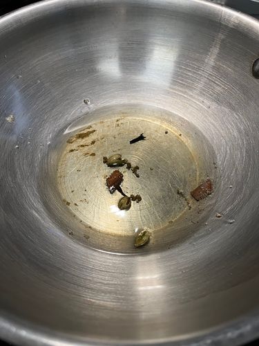 Step 2.1: Add cinnamon, cardamom, and cloves