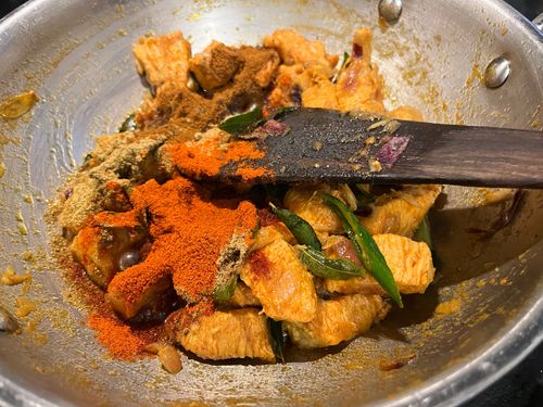Step 5.1: Add coriander powder, cumin powder, red chilli powder, garam/chicken masala, and pepper powder
