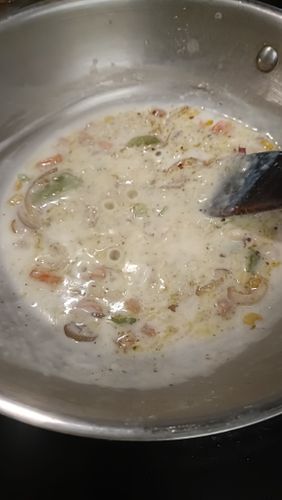 Step 3.1: Slowly add 1 cup of milk while stirring to avoid lumps