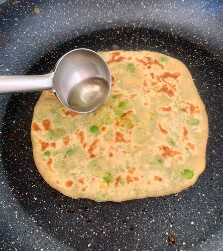 Step 4.1: Flip, apply oil, and cook both sides until crisp and golden brown