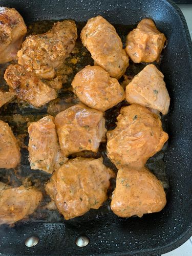 Step 3.1: Shake off any excess marinade from the chicken pieces, then sear them in batches without overcrowding