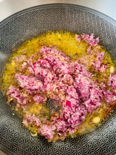 Step 4.1: Add chopped onions and sauté until golden brown and the oil begins to separate