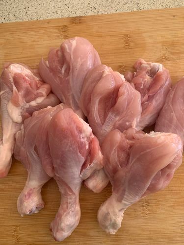Step 1.1: In a large bowl, mix the chicken legs with turmeric, salt, and lemon juice