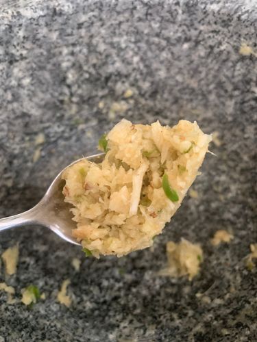 Step 4.1: Grind the garlic, ginger, and green chillies with a splash of water into a paste