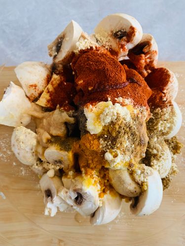 Step 2.1: Add the mushrooms and mix well to coat
