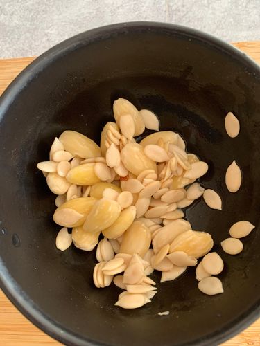 Step 1.1: Soak almonds and melon seeds in hot water for 20 minutes