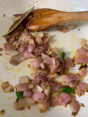 Step 4.1: Add chopped onions and sauté until soft and translucent